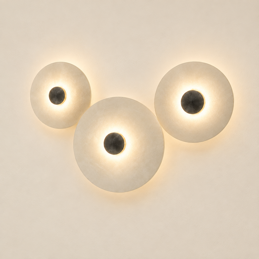 Ashby Halo Disc Wall Light – switched on, studio view