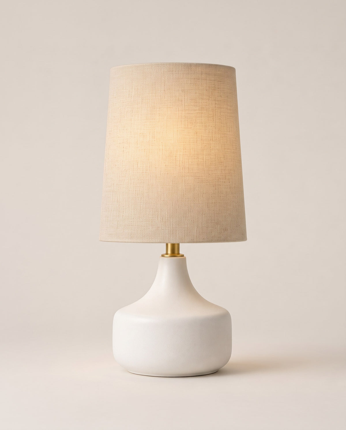 Bembridge Linen-Effect Table Lamp, switched on, studio photo