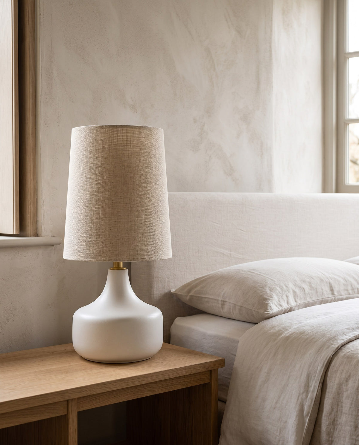 Bembridge Linen-Effect Table Lamp in a bright modern room by day