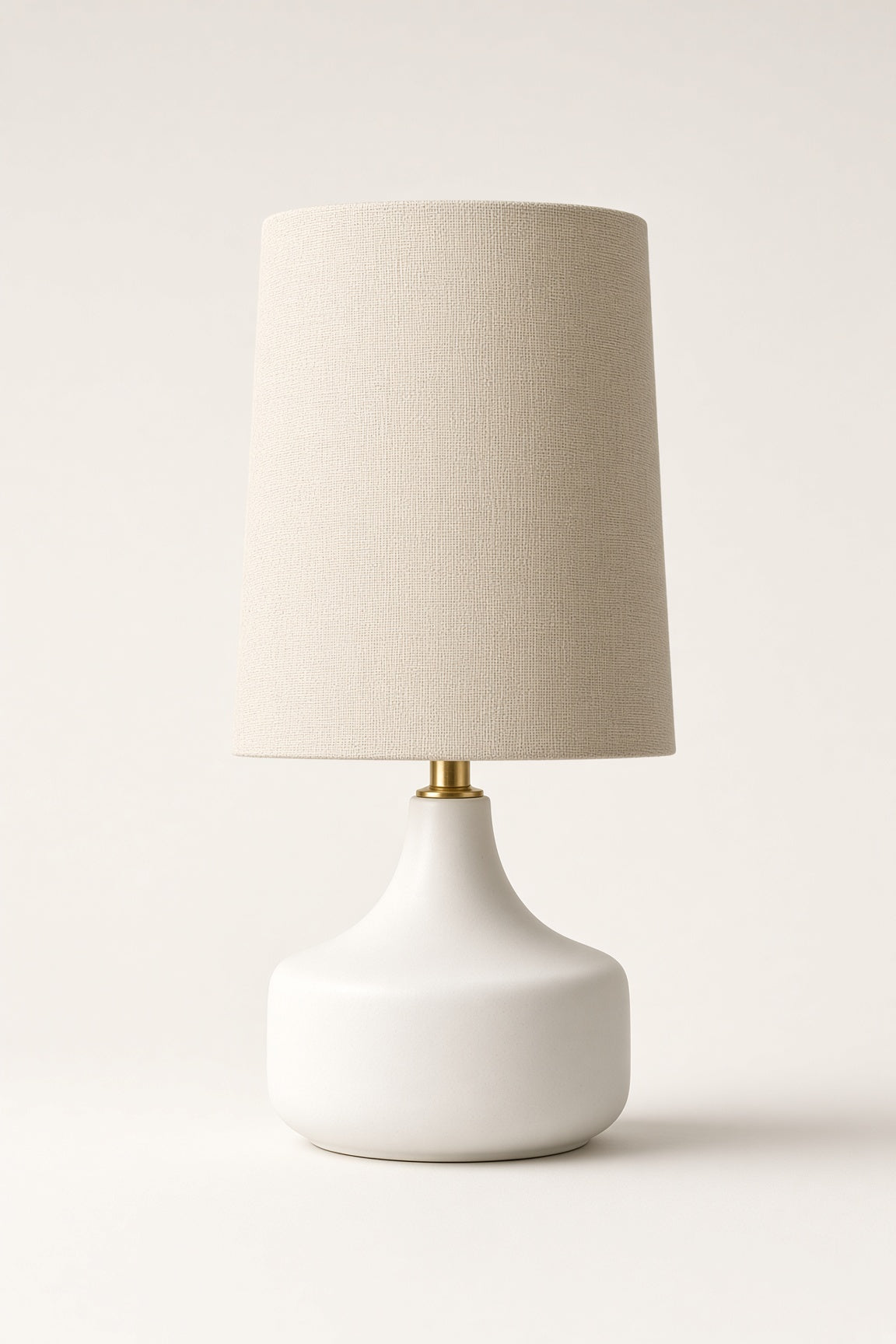 Bembridge Linen-Effect Table Lamp switched off on a plain background