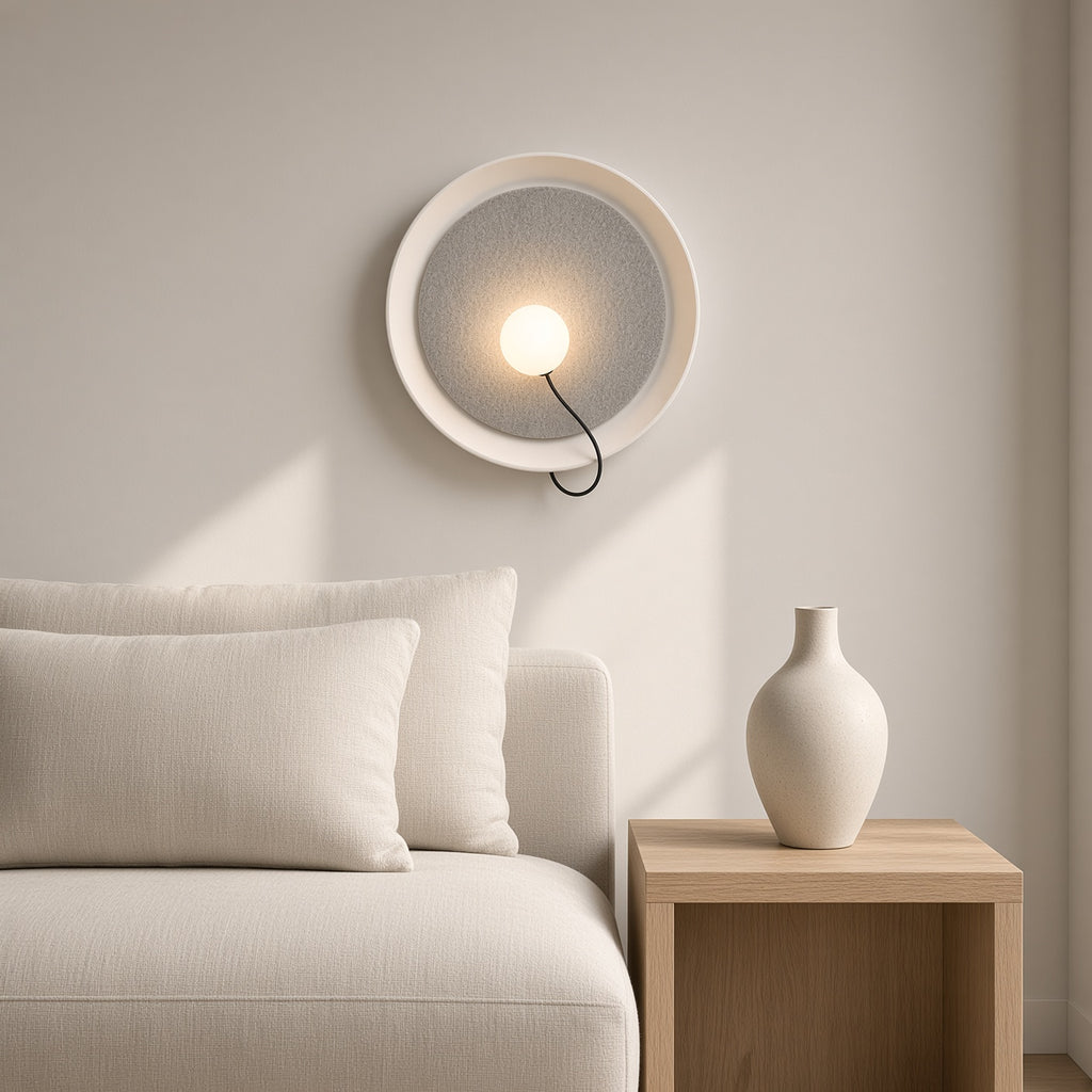 Chiltern Disc Wall Light – above a sofa in a living room