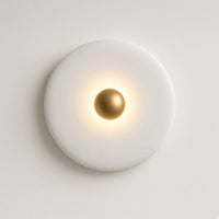 Clun Halo Disc Wall Light – studio photo, lit, on a cream background