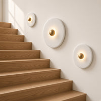 Clun Halo Disc Wall Light – three sizes on a stair wall