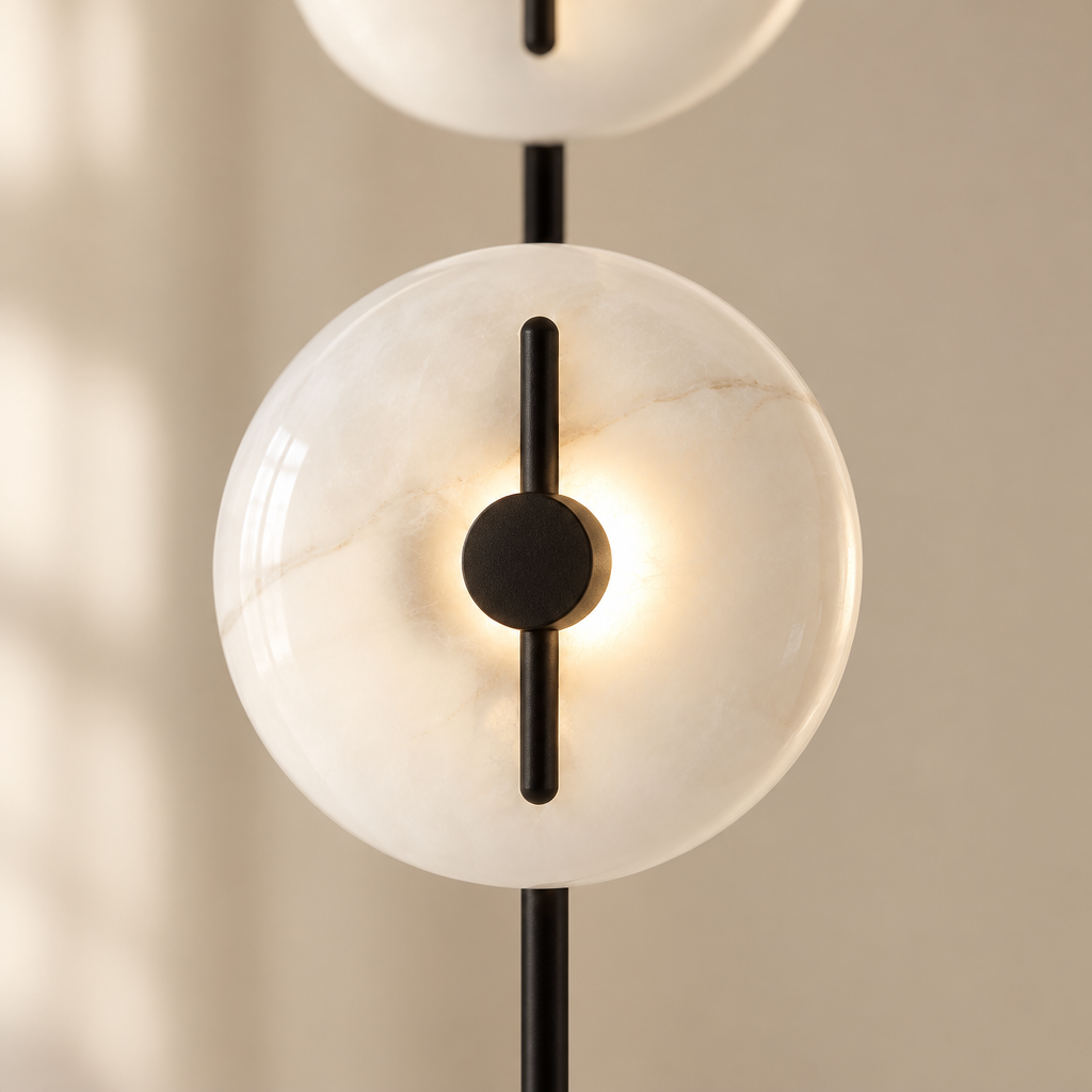 Dunster Twin Disc Floor Lamp – close-up of a glowing disc
