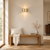 Exton Up-Down Wall Light – in a hallway above a bench
