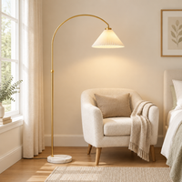 Fairford Pleated Arc Floor Lamp – in a reading corner