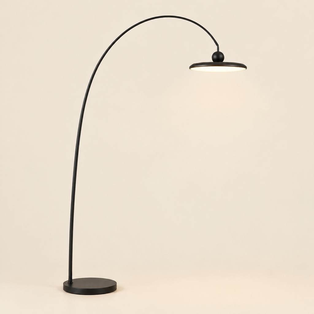 Greta Arc Floor Lamp – switched on, studio view