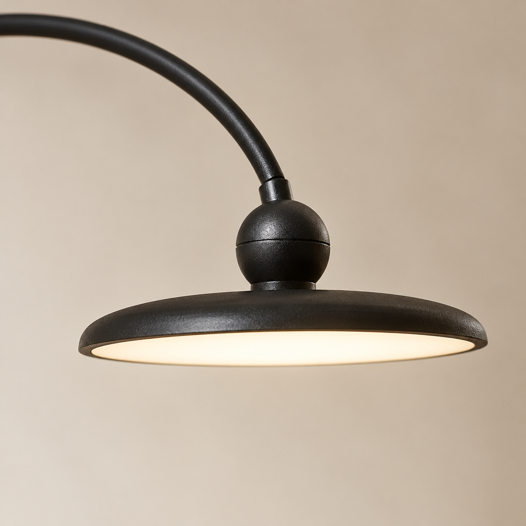 Greta Arc Floor Lamp – close-up of the disc shade and ball joint