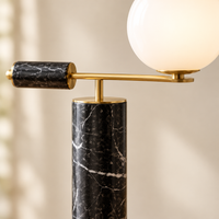 Haworth Black Marble Globe Table Lamp – close-up of the marble and copper detail