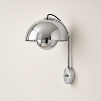 Hinton Chrome Wall Light switched off on a plain background