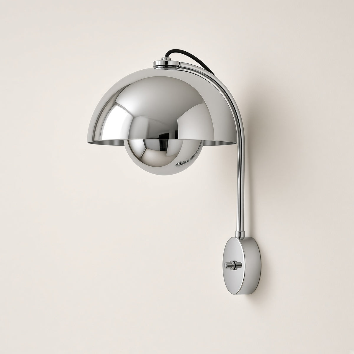 Hinton Chrome Wall Light switched off on a plain background