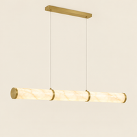 Kensal Marble-Effect Linear Pendant Light – switched on, studio view