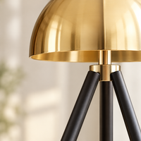 Kersey Gold Dome Tripod Table Lamp – close-up of the gold dome and tripod joint