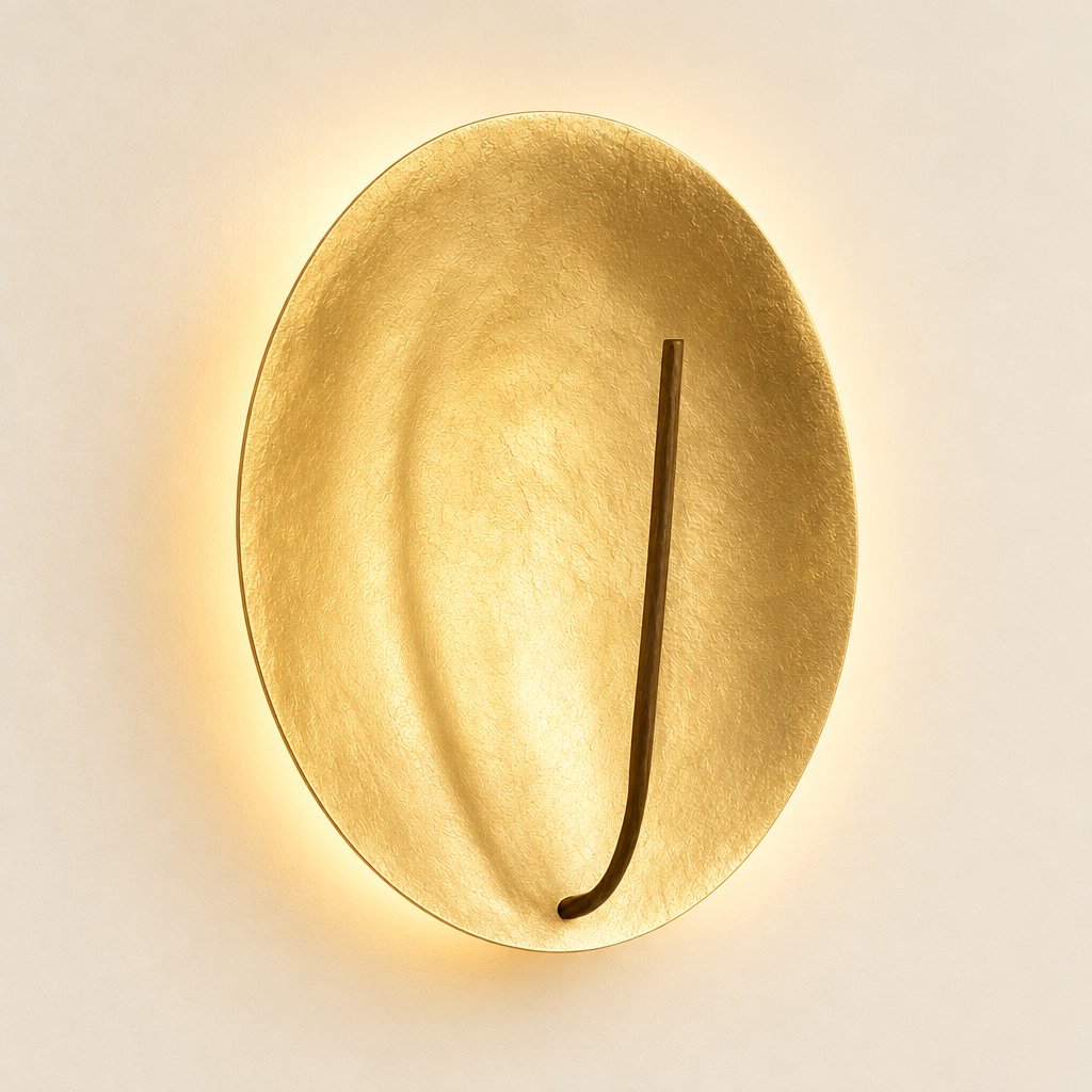 Kilve Gold Disc Wall Light – switched on, studio view
