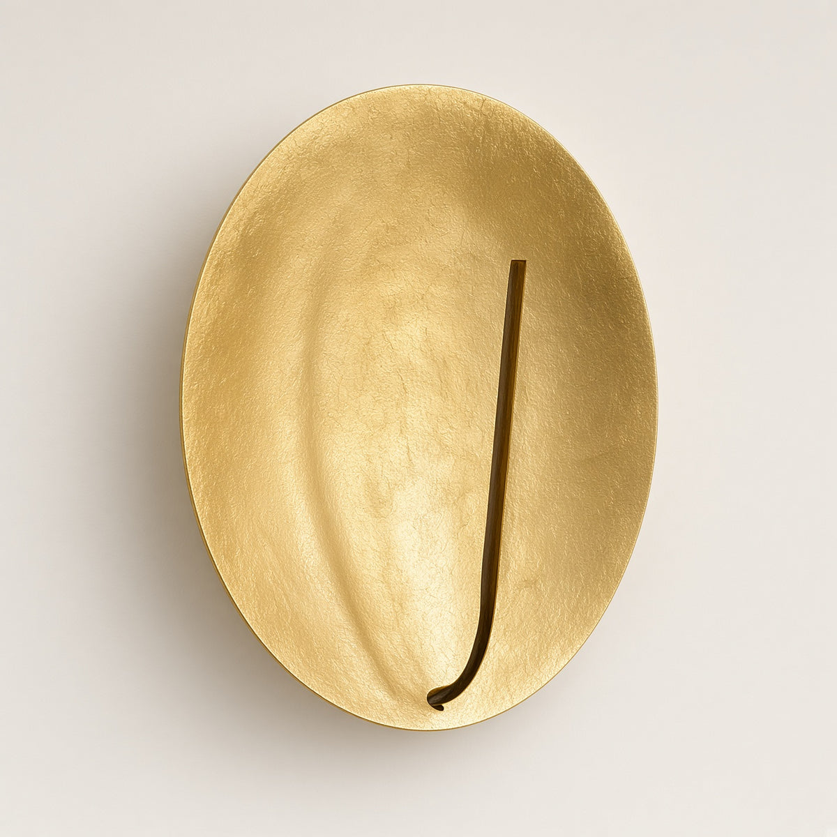 Kilve Gold Disc Wall Light switched off on a plain background