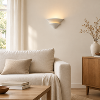 Lune Tiered Uplighter Wall Light – above a sofa