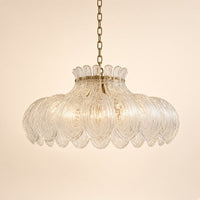 Malham Textured Glass Pendant Light – studio photo, lit, on a cream background