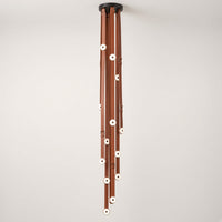 Mortlake Leather Chandelier switched off on a plain background