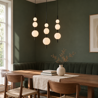 Norham Opal Glass Bubble Pendant Light – over a dining banquette
