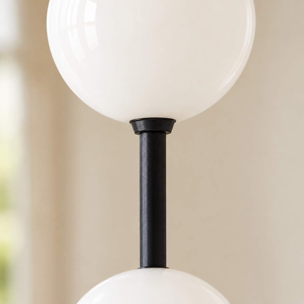 Norham Opal Glass Bubble Pendant Light – close-up of an opal glass sphere on its black rod