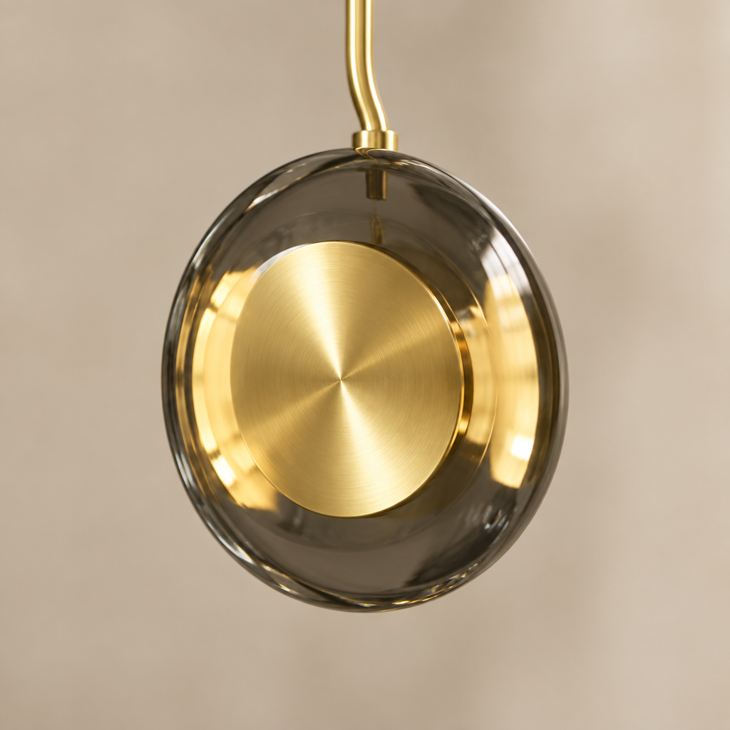 Painswick Smoked Glass Disc Pendant Light – close-up of the smoked glass lens and gold disc