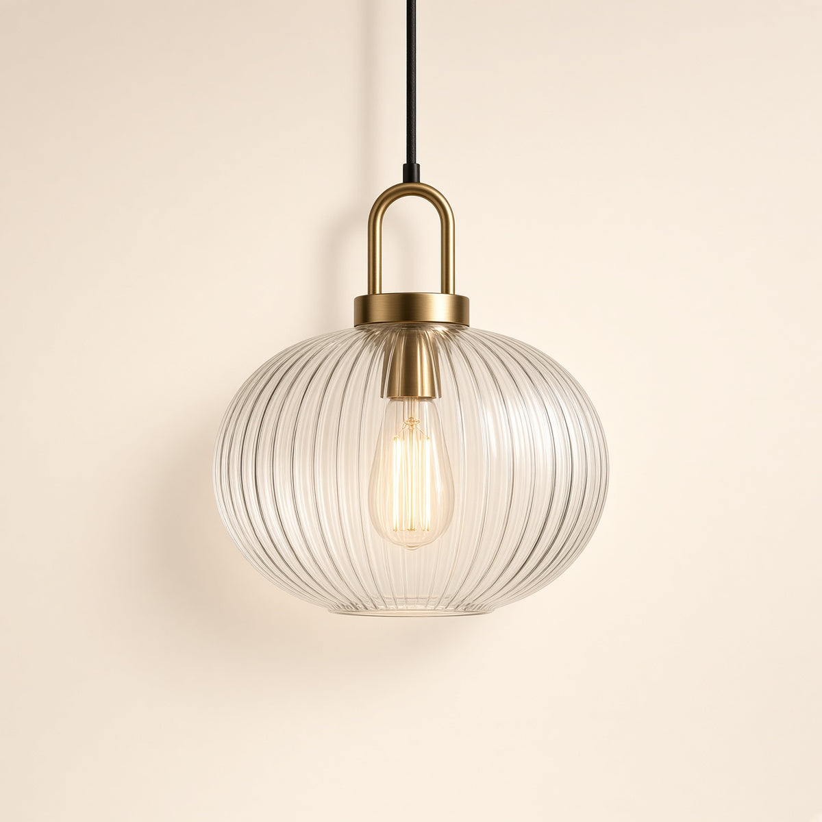 Westbury Ribbed Glass Pendant Light – studio photo, lit, on a cream background