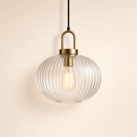 Westbury Ribbed Glass Pendant Light – studio photo, lit, on a cream background