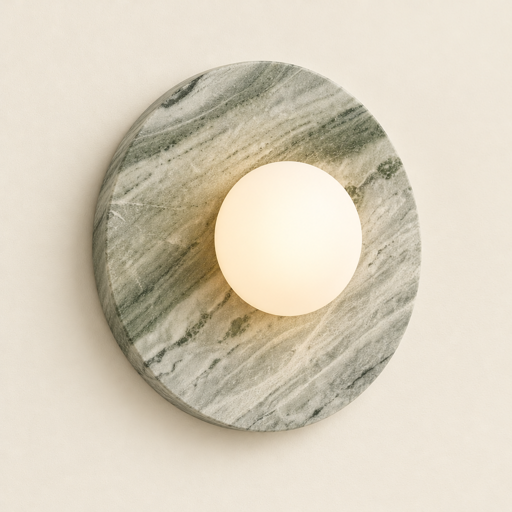 Whitby Marble-Effect Wall Light – switched on, studio view