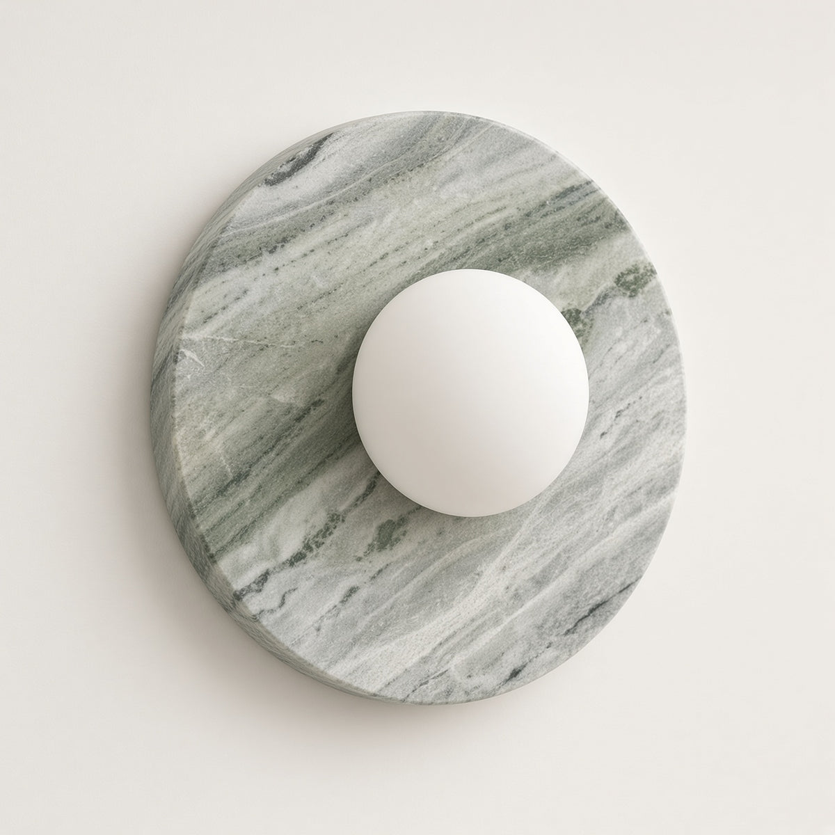 Whitby Marble-Effect Wall Light switched off on a plain background